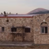 orthodox-donation-support-monastery A serene view of the St. John of the Ladder monastery in Greece, where your Orthodox donation directly supports our daily life and prayers.